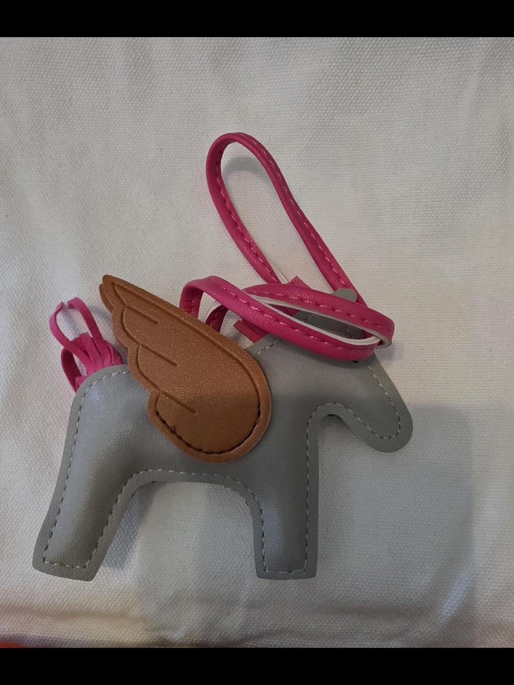 Gray Leather Horse Charm with Pink Strap and Brown Wing